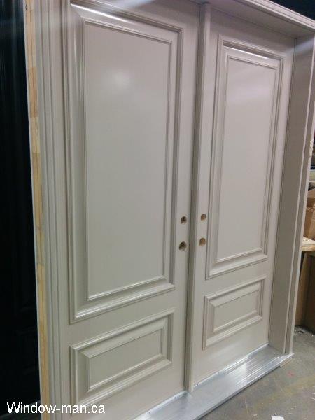 Double front entry steel insulated white exterior doors prehung. Executive panels. Two panel